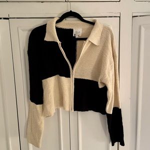 Le Lis Collection Zip Up Collared Color Block Sweater in Black and White